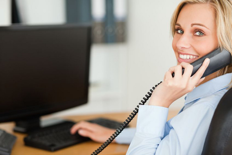 Smiling Business Woman on Phone