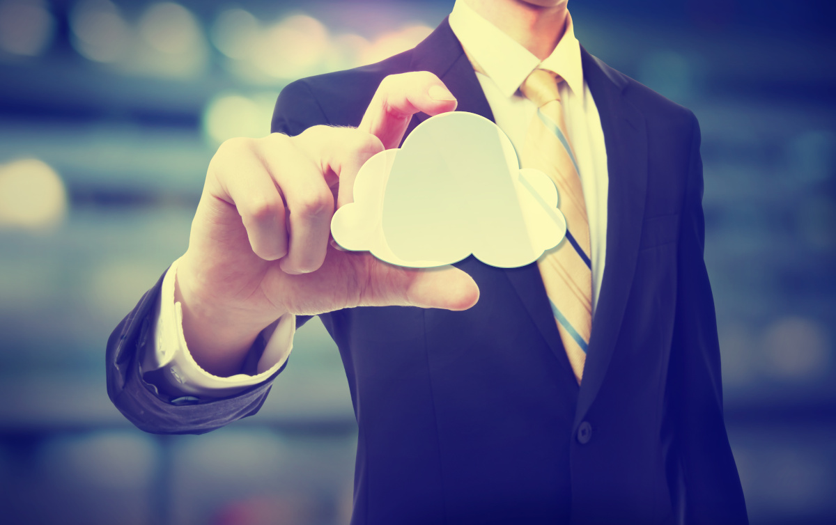 Businessman Holding Cloud Icon