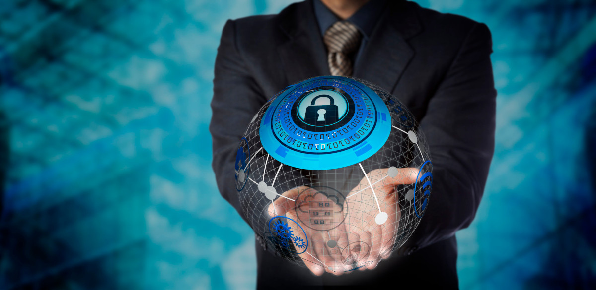 Man holding digital globe with cybersecurity padlock on it